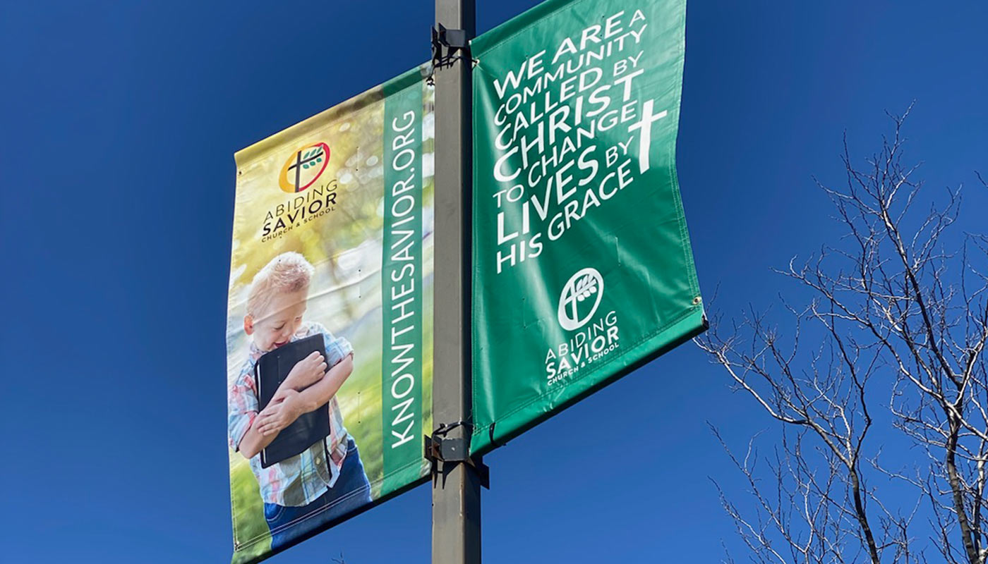 Parking Lot Banner Design for Abiding Savior (Volunteer)